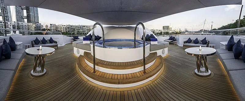 a boat on a deck aboard WHITE RABBIT Yacht for Sale