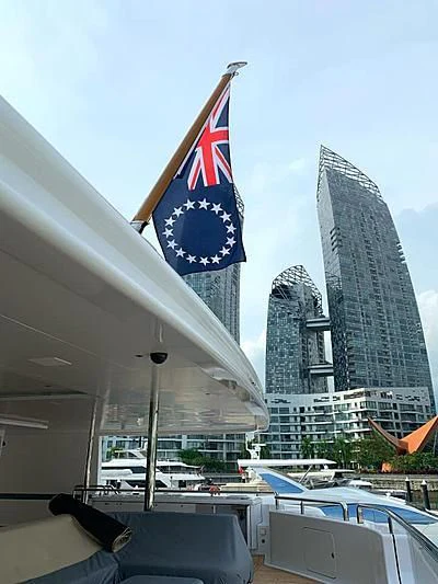 a flag on a pole aboard WHITE RABBIT Yacht for Sale