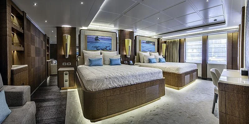 a large bedroom with a large bed aboard WHITE RABBIT Yacht for Sale