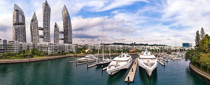 a group of boats in a harbor aboard WHITE RABBIT Yacht for Sale