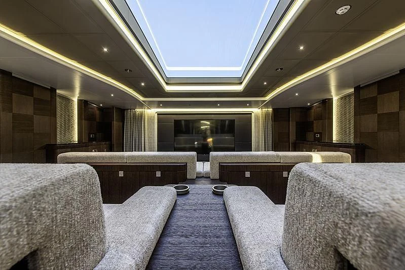 a train station with benches aboard WHITE RABBIT Yacht for Sale
