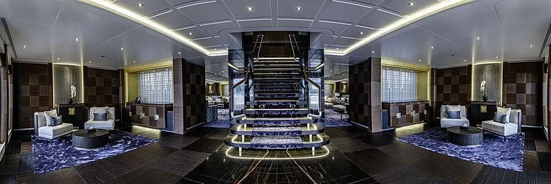 a large room with a large indoor pool aboard WHITE RABBIT Yacht for Sale