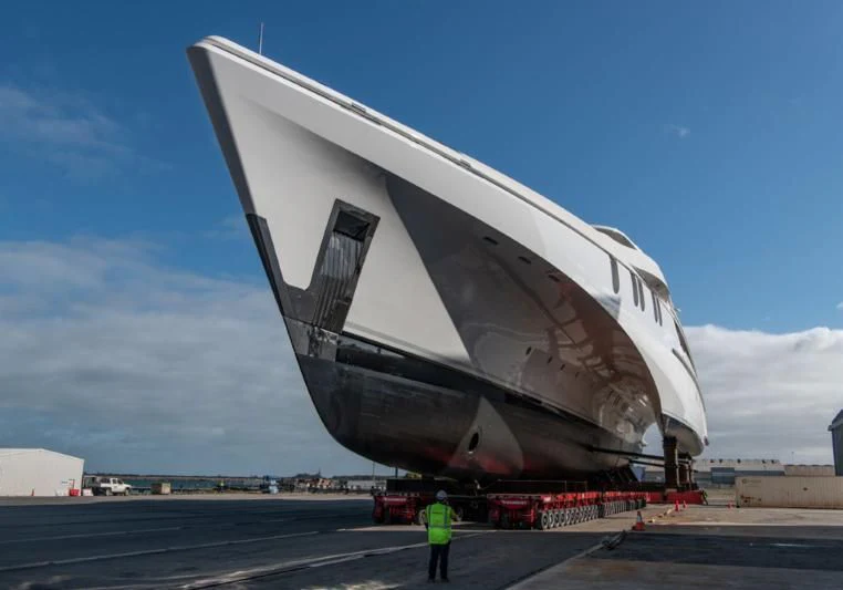 a large white satellite dish with EYE Film Institute Netherlands in the background aboard WHITE RABBIT Yacht for Sale