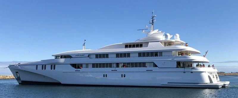 a large white ship aboard WHITE RABBIT Yacht for Sale