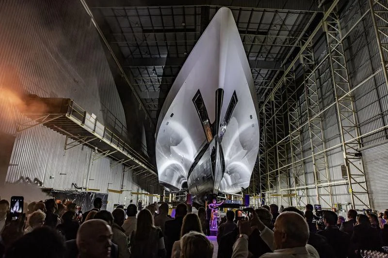 a large crowd of people in a large room with a large white spherical object aboard WHITE RABBIT Yacht for Sale