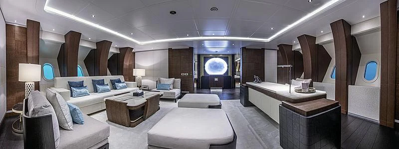 a room with a bed and a couch aboard WHITE RABBIT Yacht for Sale