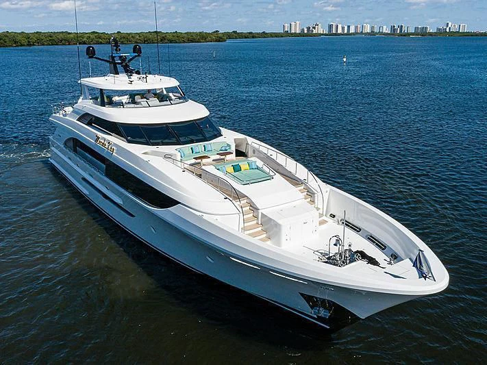a white boat on the water aboard FLAMINGO DAZE Yacht for Sale