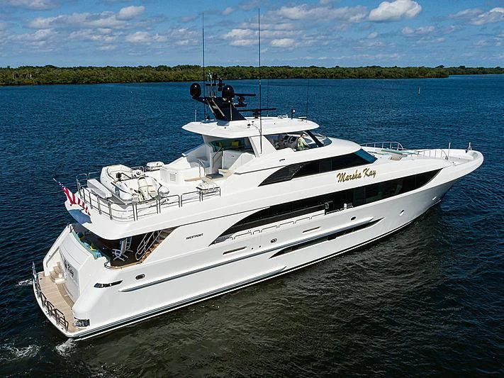 a white yacht on the water aboard FLAMINGO DAZE Yacht for Sale