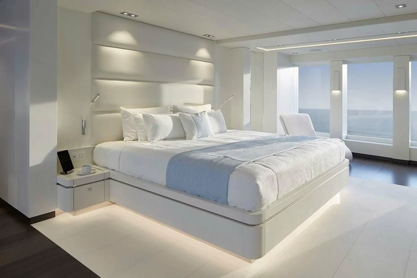 a bed in a room aboard HOME Yacht for Charter