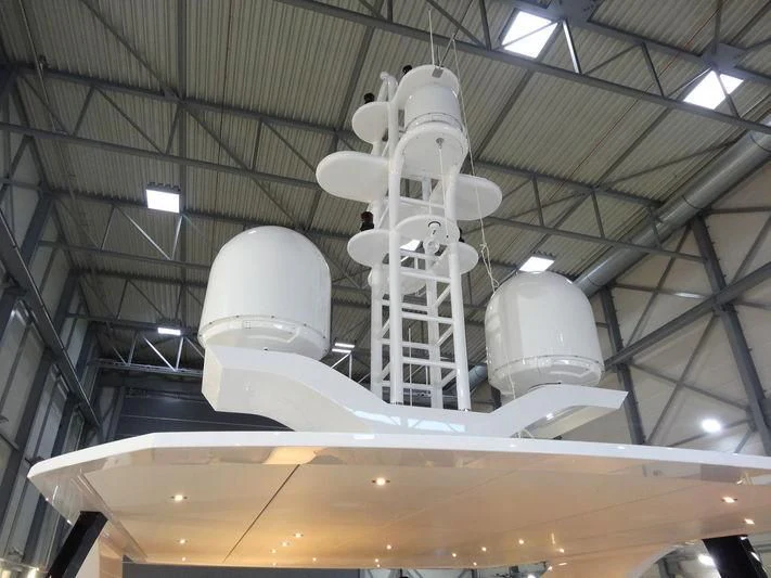 a large white machine aboard HOME Yacht for Charter