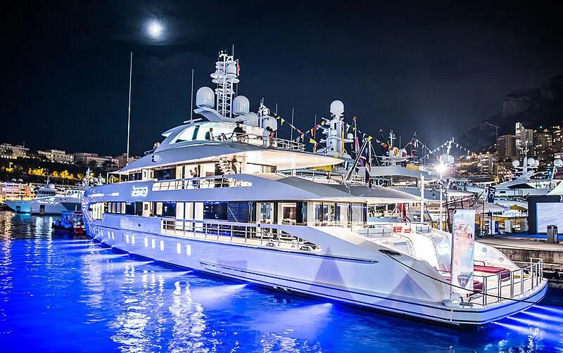 a large white boat in the water aboard HOME Yacht for Charter
