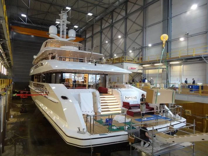 a large white ship in a building aboard HOME Yacht for Charter