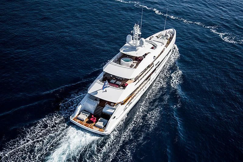 a ship sailing on the sea aboard HOME Yacht for Charter