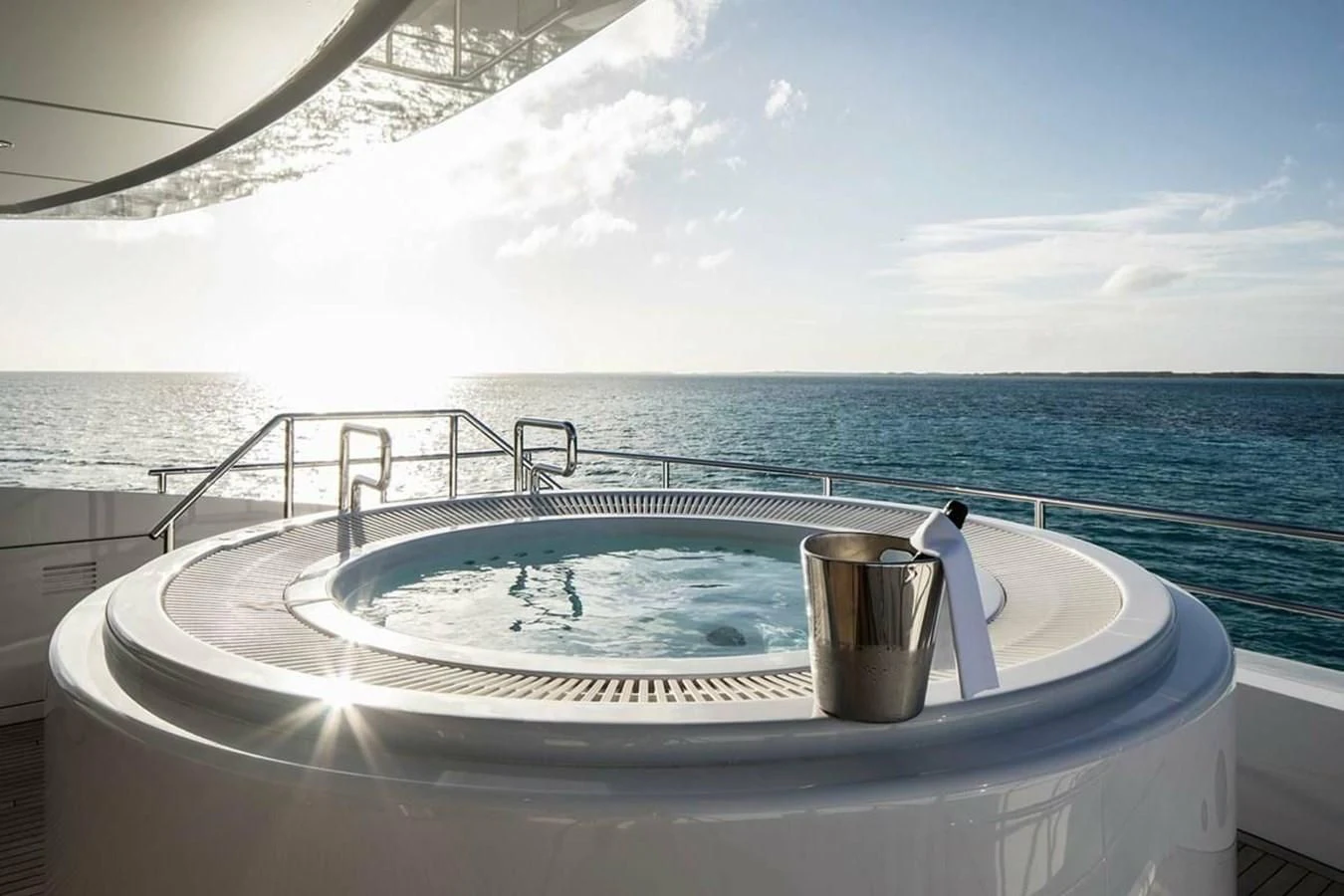 a tub with a cup and a cup on it aboard HOME Yacht for Charter
