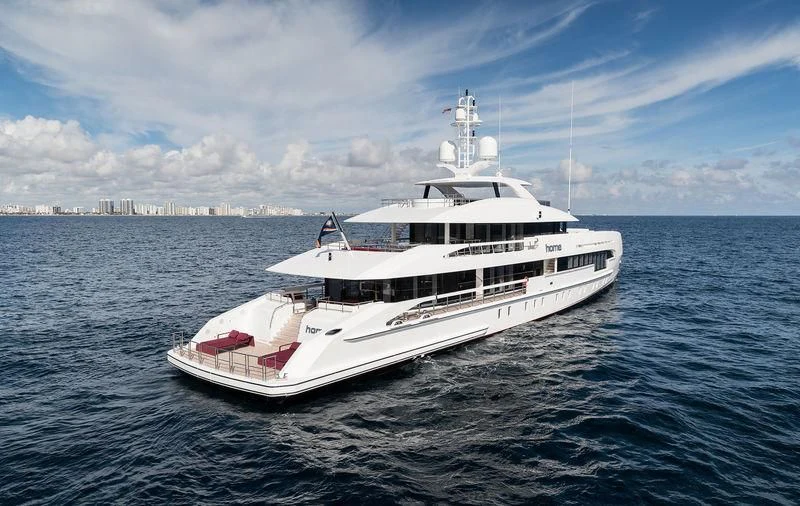 a white boat in the water aboard HOME Yacht for Charter