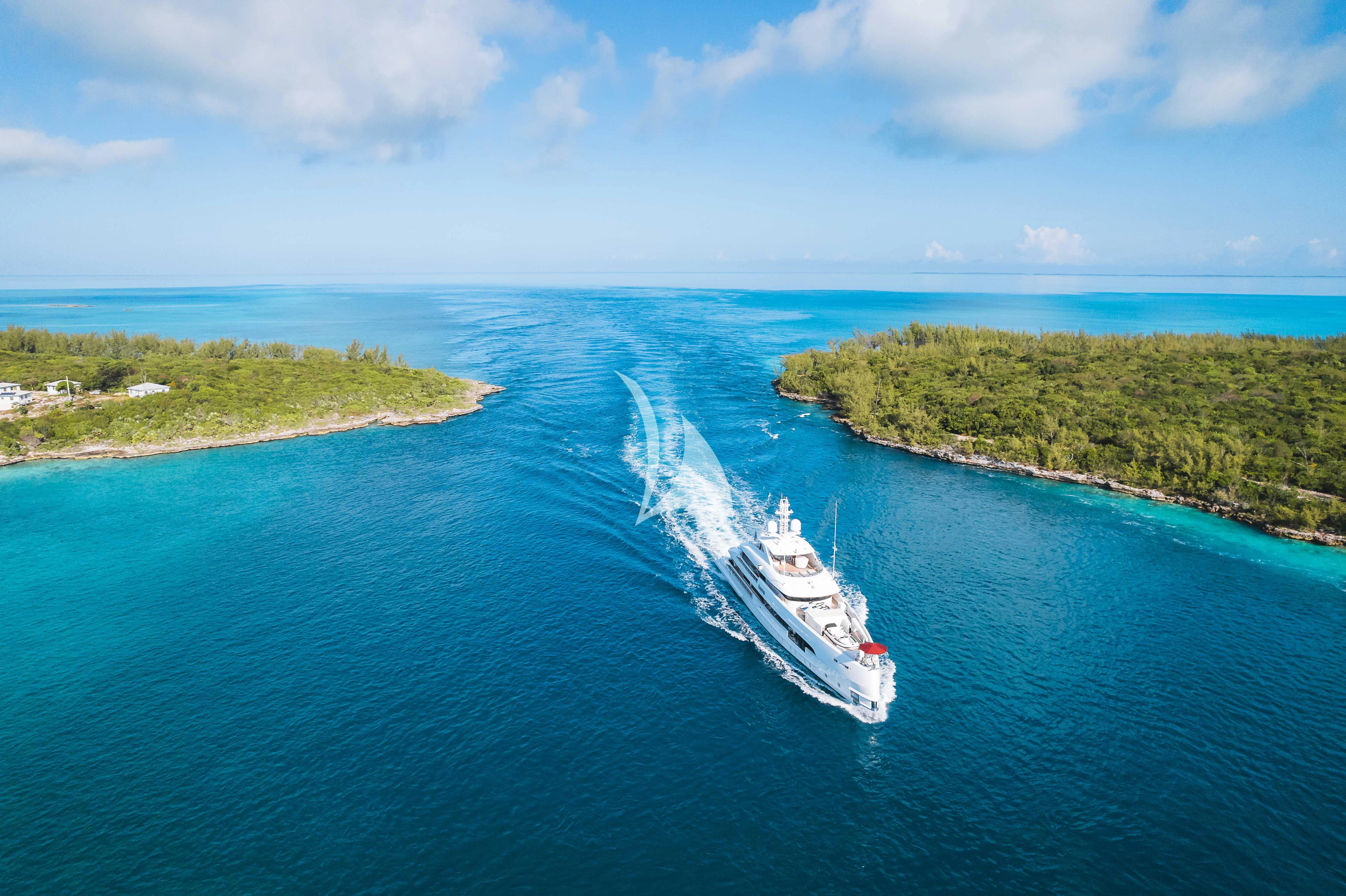 a boat sailing on the water aboard HOME Yacht for Charter