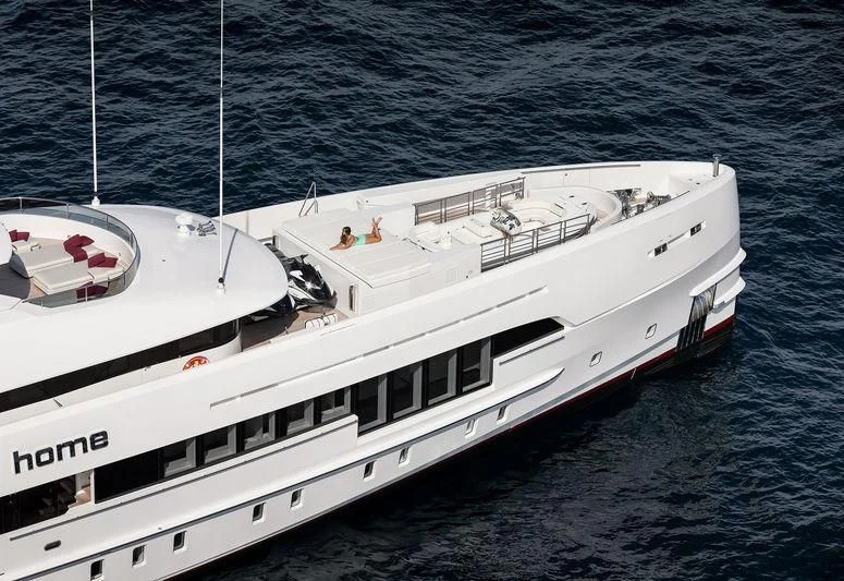 a white yacht in the water aboard HOME Yacht for Charter