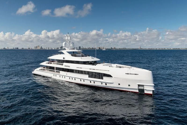 a white boat in the water aboard HOME Yacht for Charter