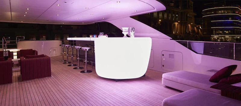 a large white object on a red surface aboard HOME Yacht for Charter