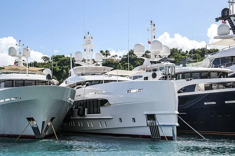 several boats in the water aboard HOME Yacht for Charter
