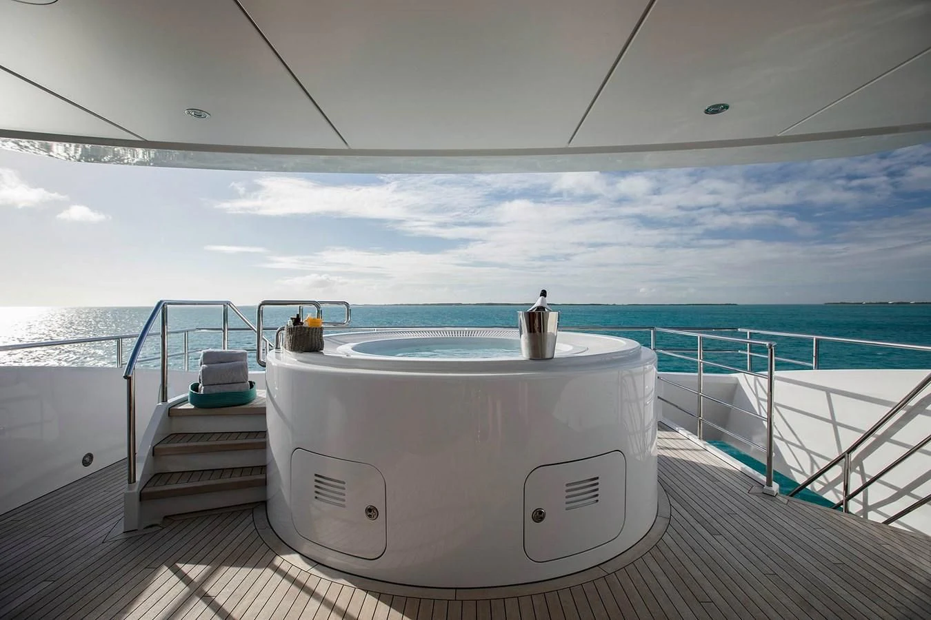 a white rectangular object on a deck aboard HOME Yacht for Charter
