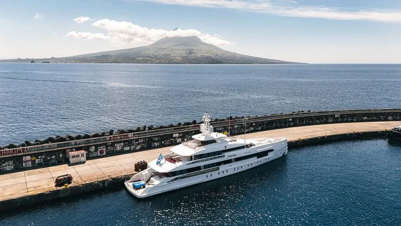 a large ship on the water aboard HOME Yacht for Charter