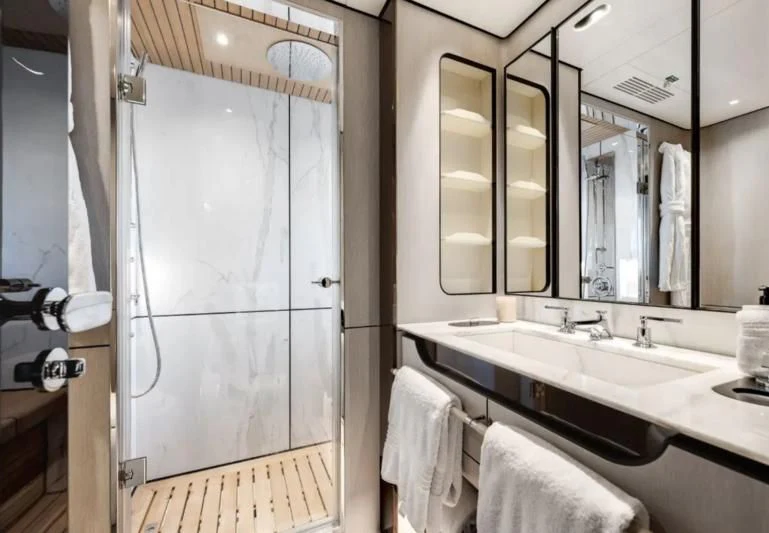 a bathroom with a large mirror aboard ECLIPSE Yacht for Sale