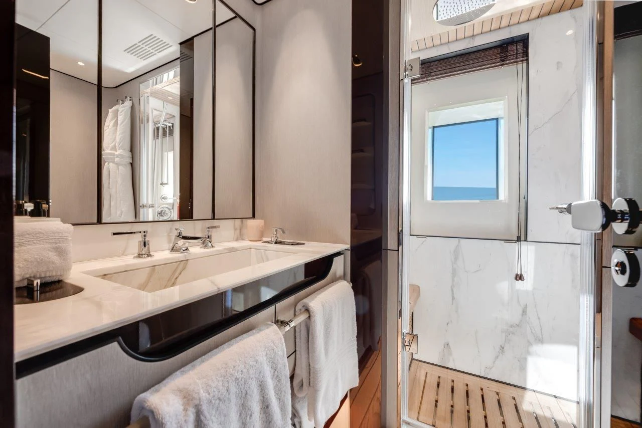 a bathroom with a sink and a mirror aboard ECLIPSE Yacht for Sale