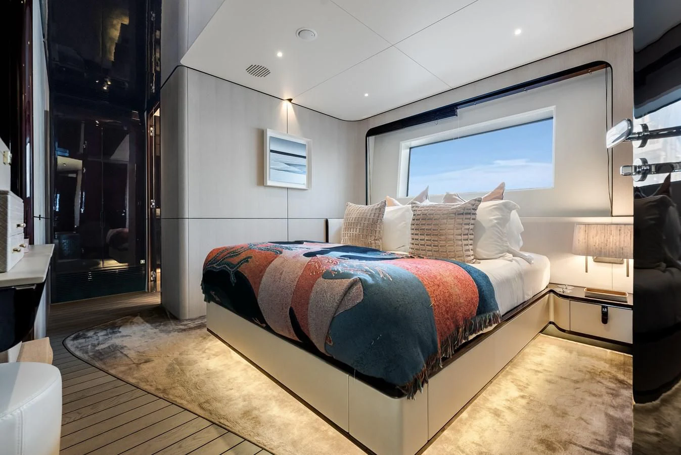 a bed in a room aboard ECLIPSE Yacht for Sale