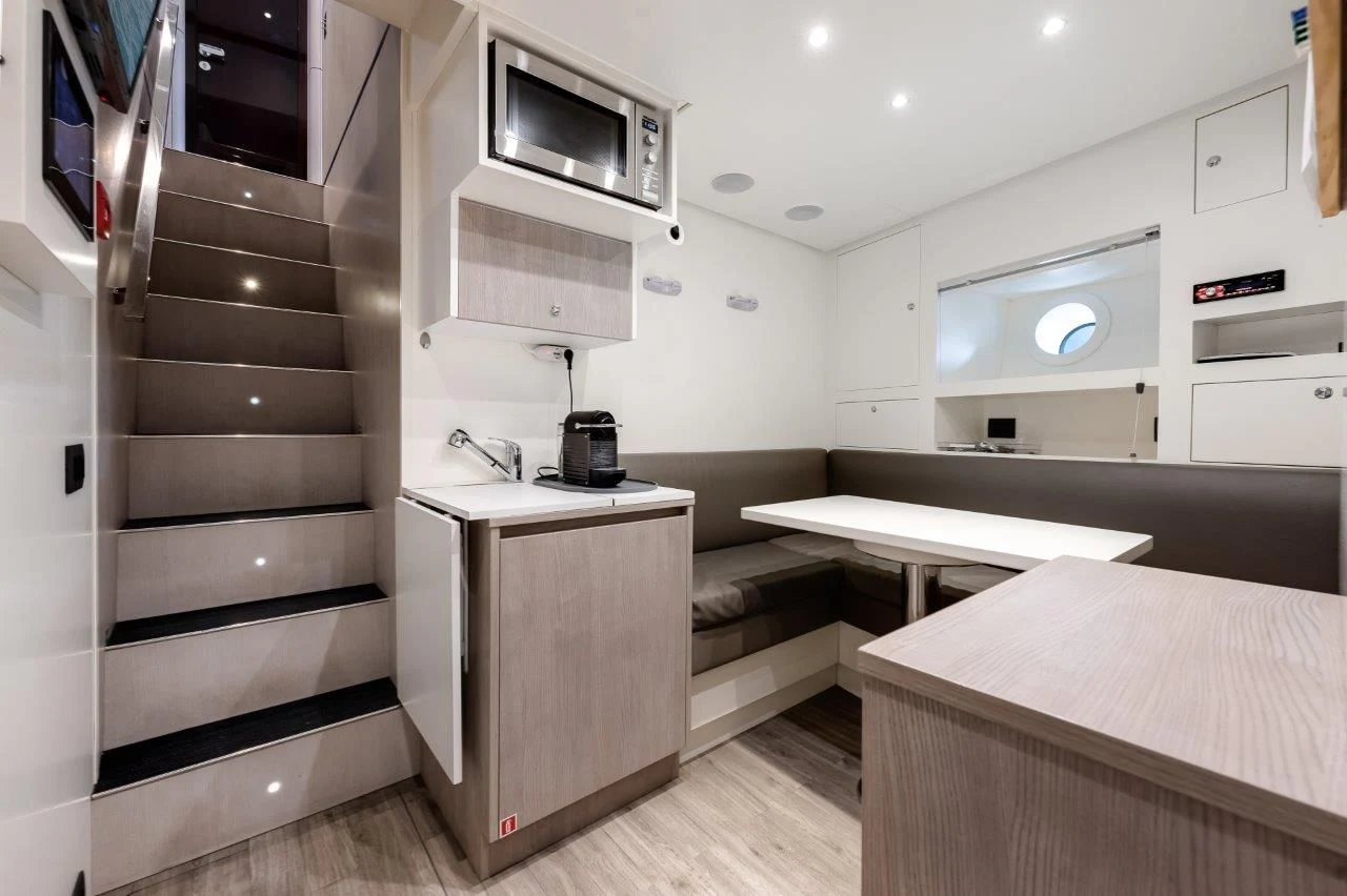 a room with a bed and a desk aboard ECLIPSE Yacht for Sale
