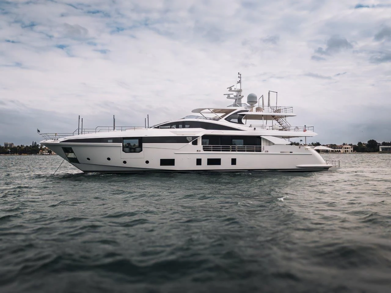 a white yacht in the water aboard ECLIPSE Yacht for Sale