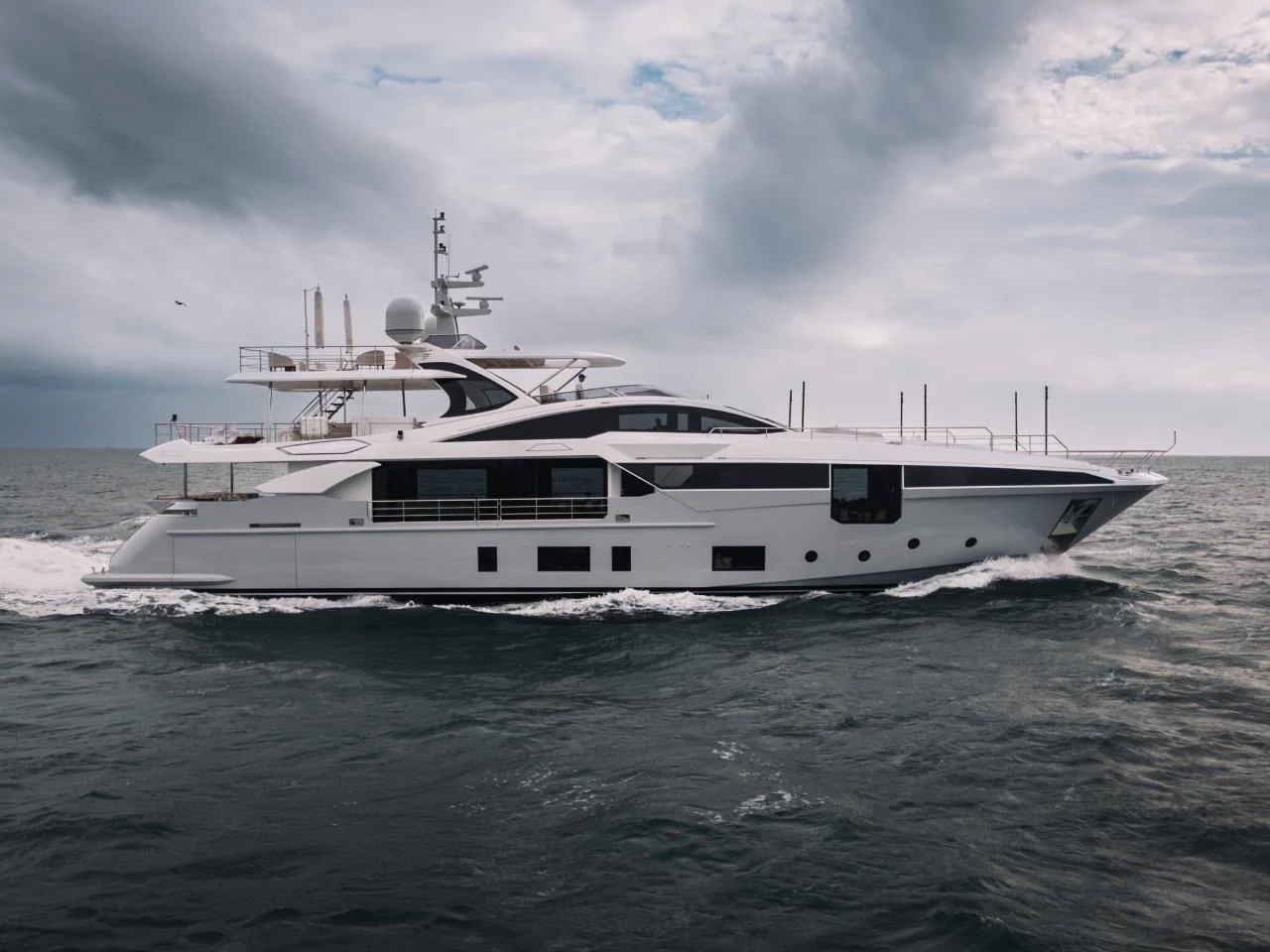 a white yacht in the water aboard ECLIPSE Yacht for Sale
