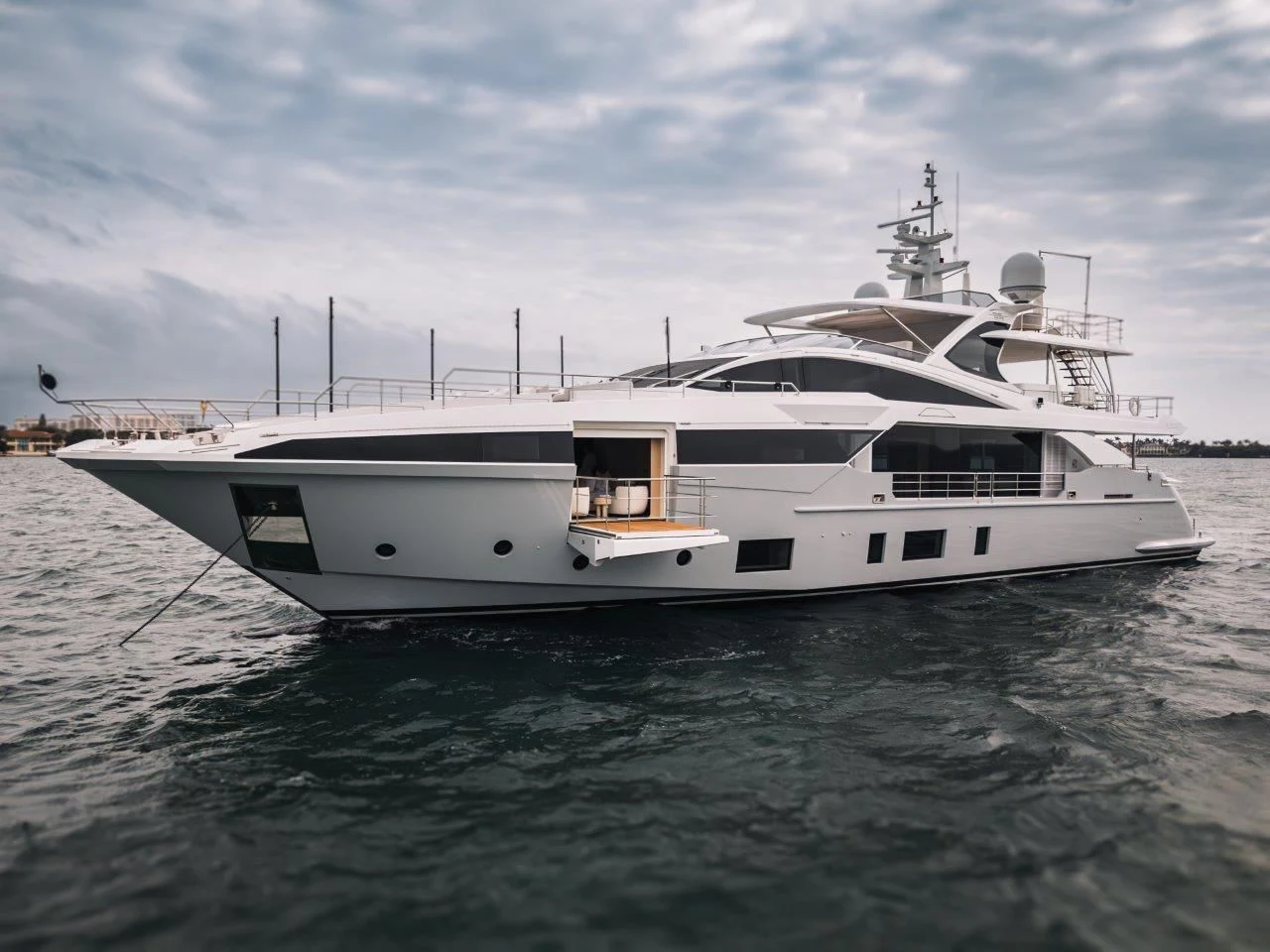 a white yacht on the water aboard ECLIPSE Yacht for Sale