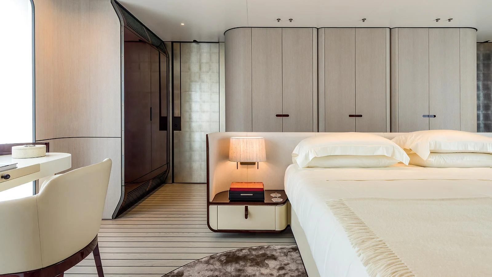 a room with a bed and a desk aboard ECLIPSE Yacht for Sale