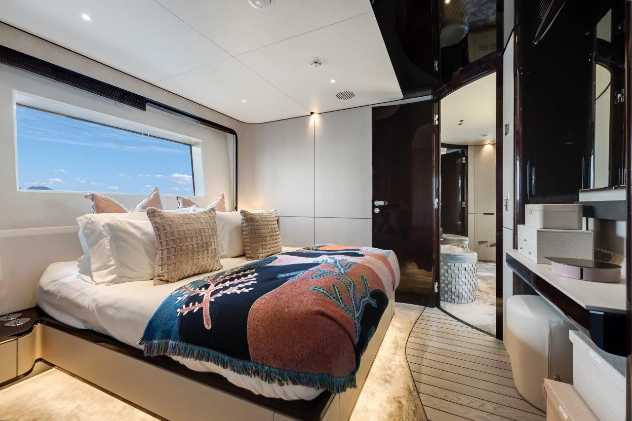 a bed in a room aboard ECLIPSE Yacht for Sale