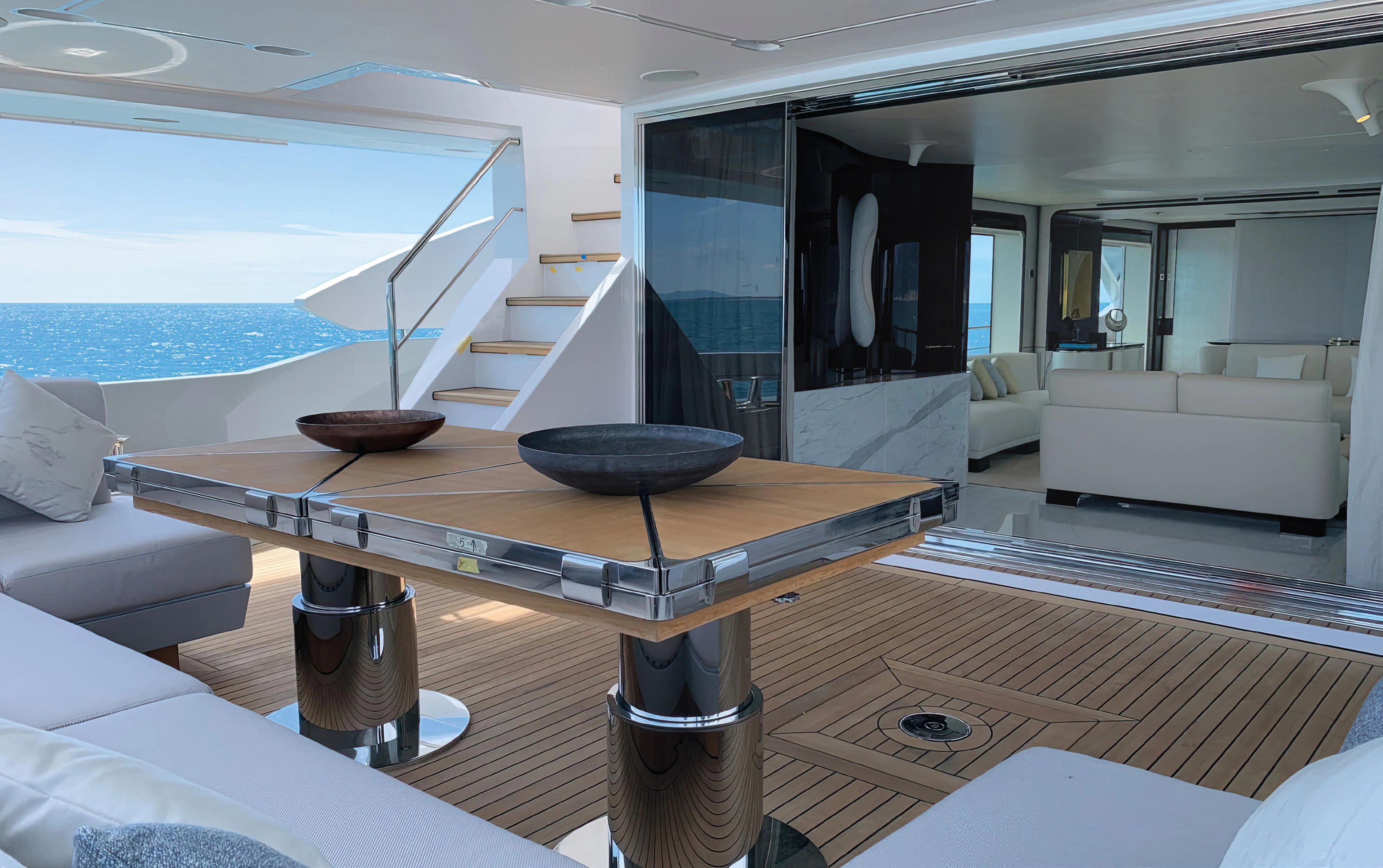 a table with a bowl on it aboard ECLIPSE Yacht for Sale