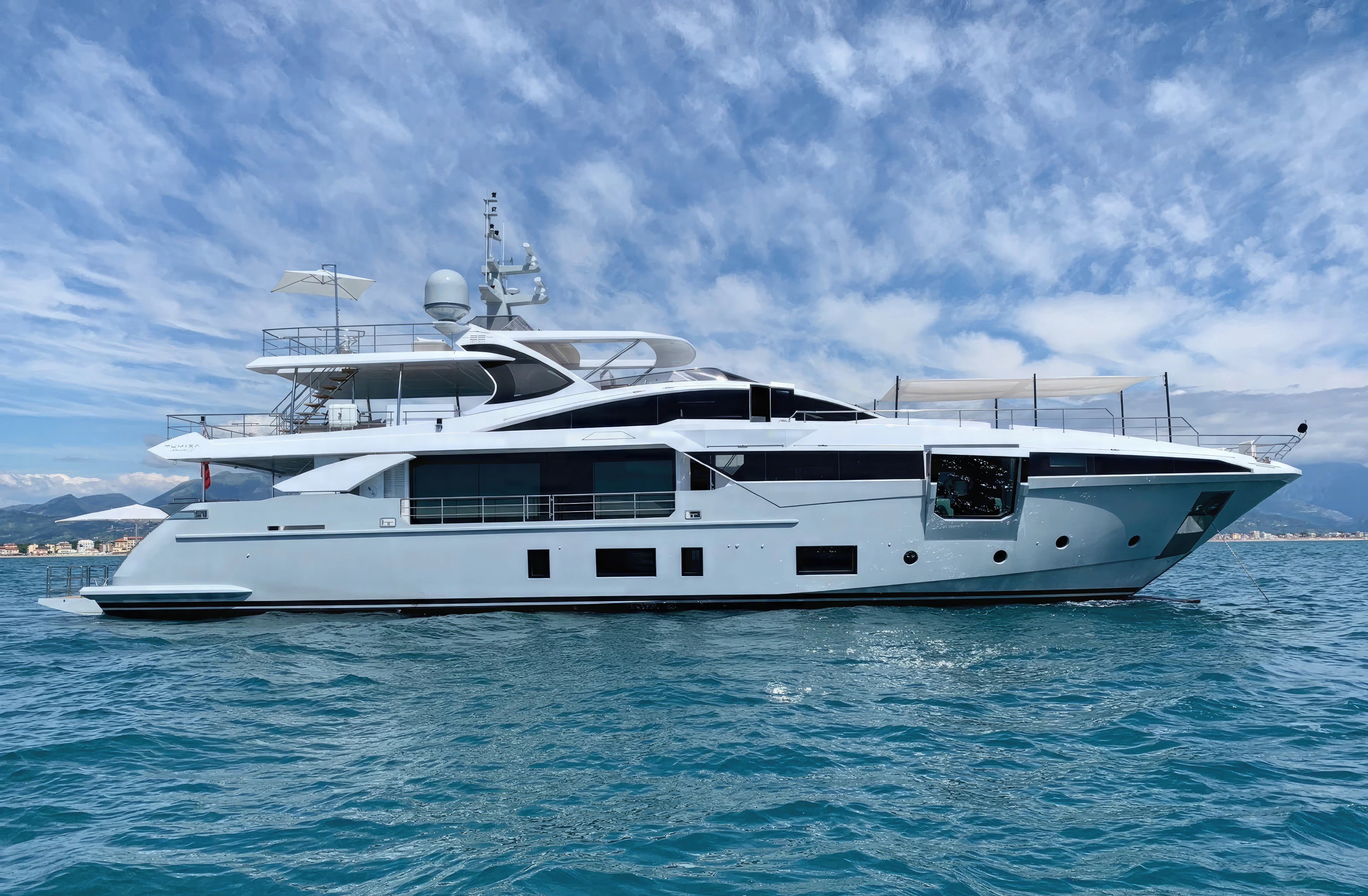 a white yacht in the water aboard ECLIPSE Yacht for Sale