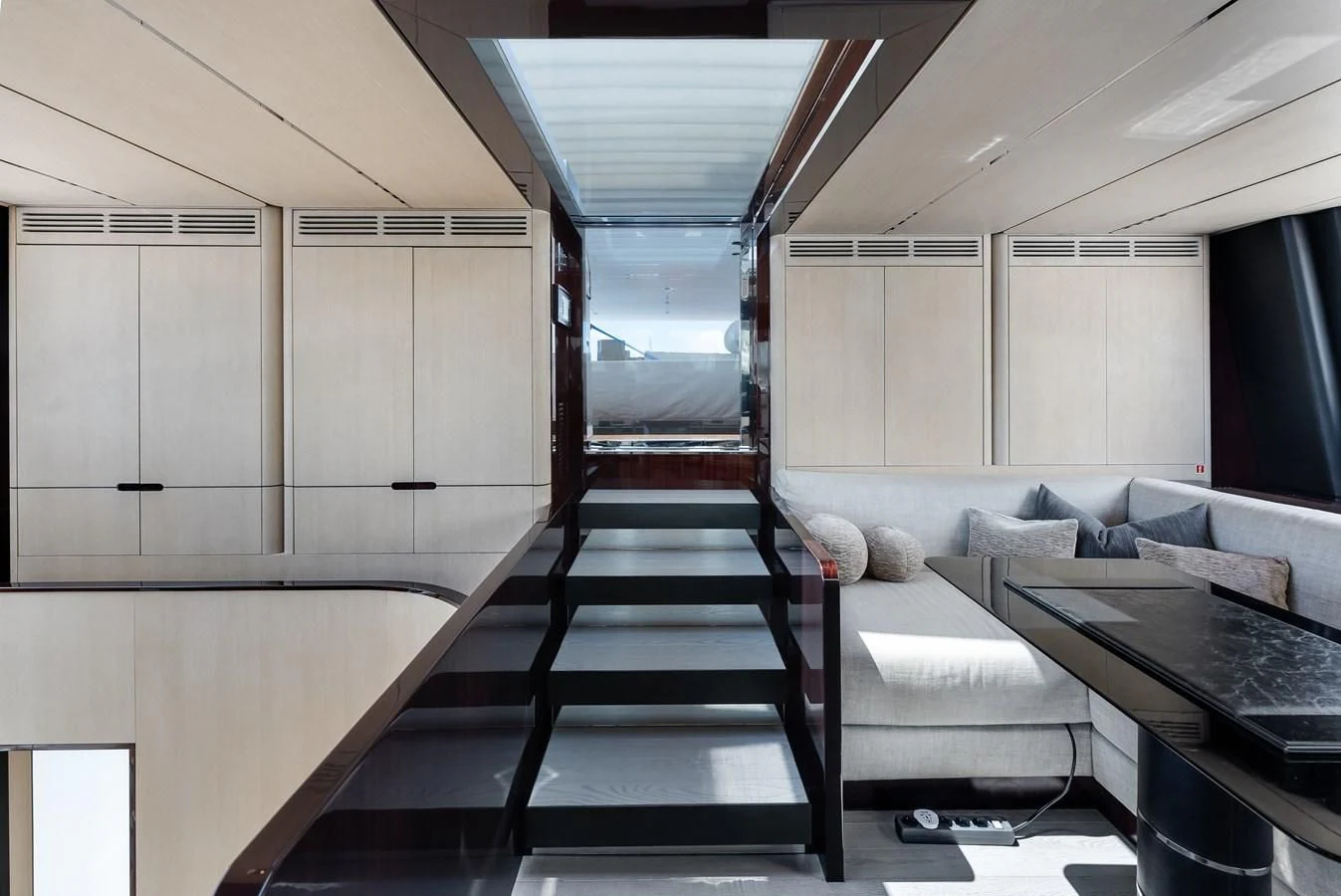 a room with a couch and a table aboard ECLIPSE Yacht for Sale