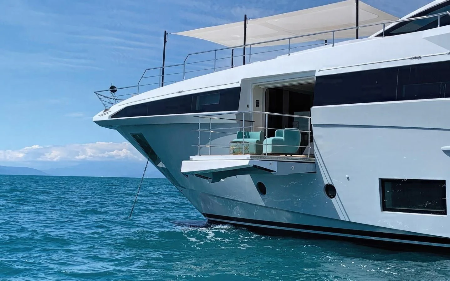 a white yacht in the water aboard ECLIPSE Yacht for Sale