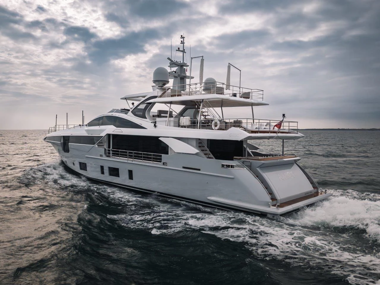 a white yacht on the water aboard ECLIPSE Yacht for Sale