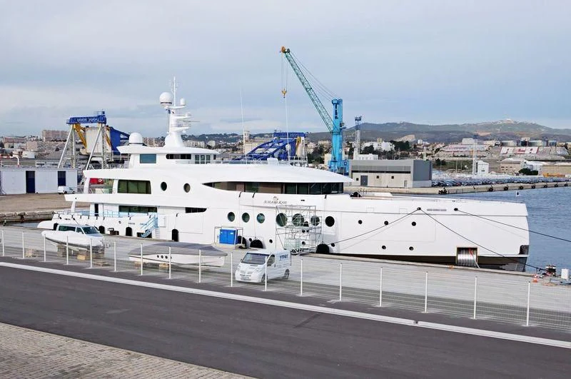 a large white boat aboard MADAME KATE Yacht for Sale
