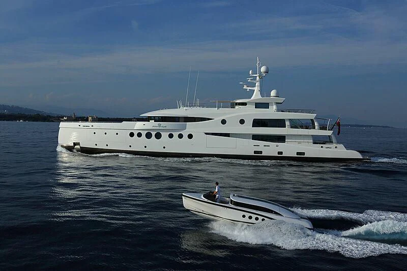 a white boat on the water aboard MADAME KATE Yacht for Sale