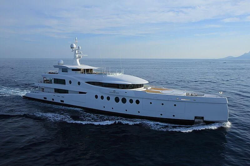 a large white ship in the water aboard MADAME KATE Yacht for Sale