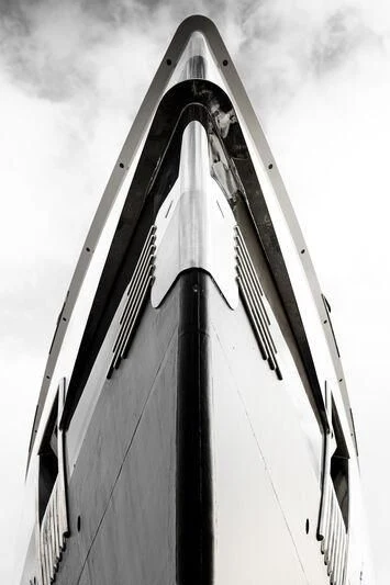 a tall building with a pointed roof aboard MADAME KATE Yacht for Sale