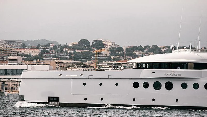 a white yacht in the water aboard MADAME KATE Yacht for Sale