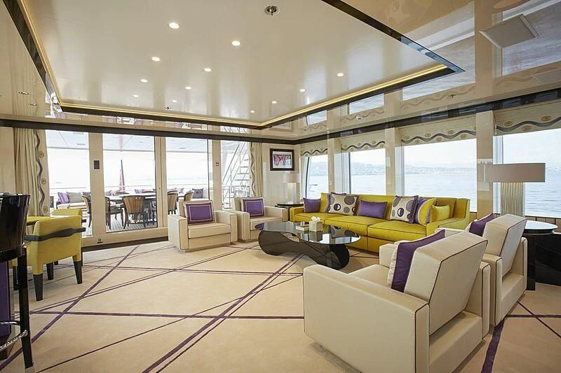 a living room with a large window aboard MADAME KATE Yacht for Sale