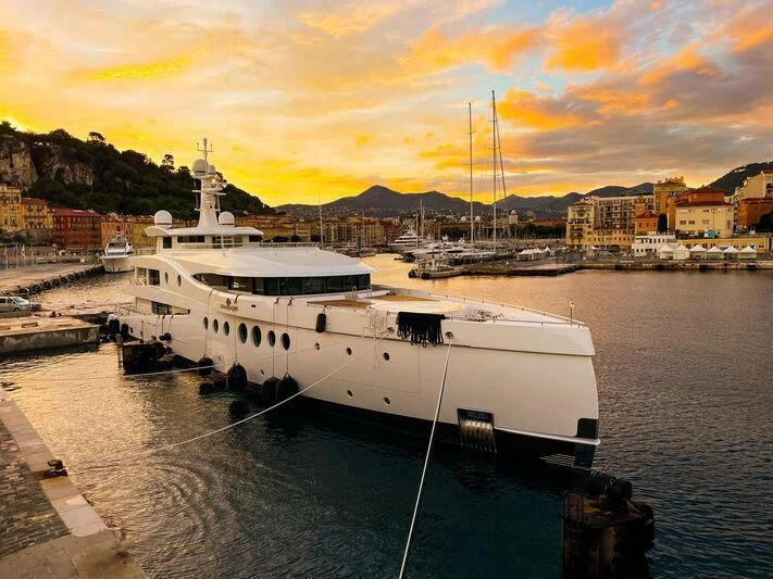 a boat docked at a dock aboard MADAME KATE Yacht for Sale