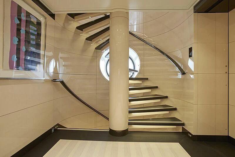 a staircase in a building aboard MADAME KATE Yacht for Sale