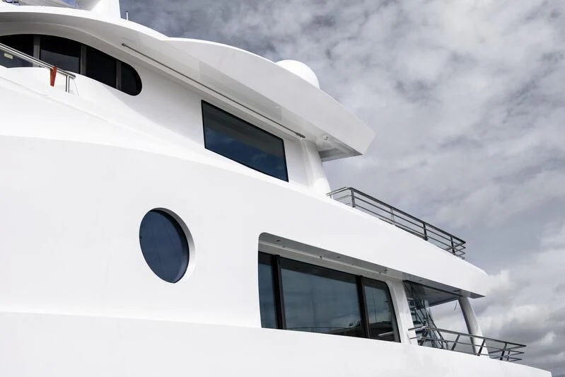 a white airplane with a round window aboard MADAME KATE Yacht for Sale