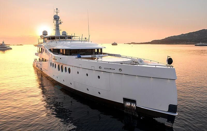 a large ship in the water aboard MADAME KATE Yacht for Sale